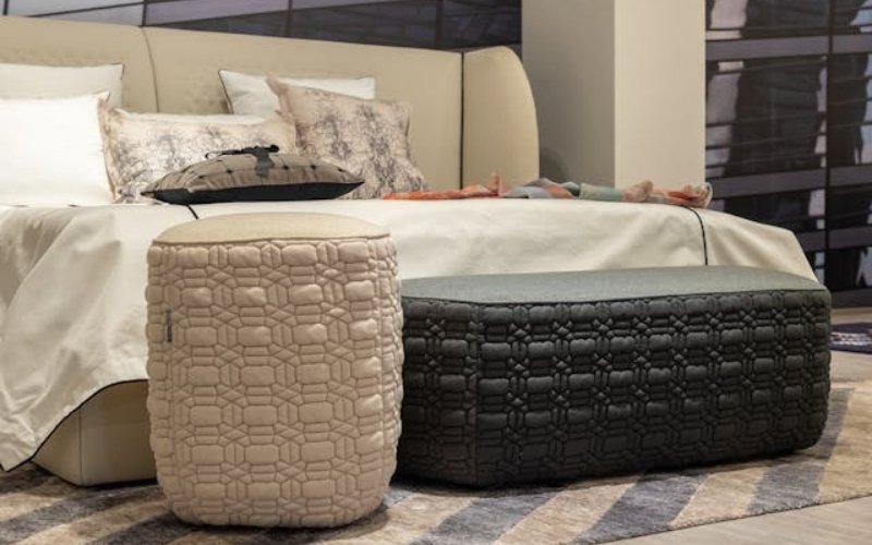 Stylish living room with sofa and ottoman