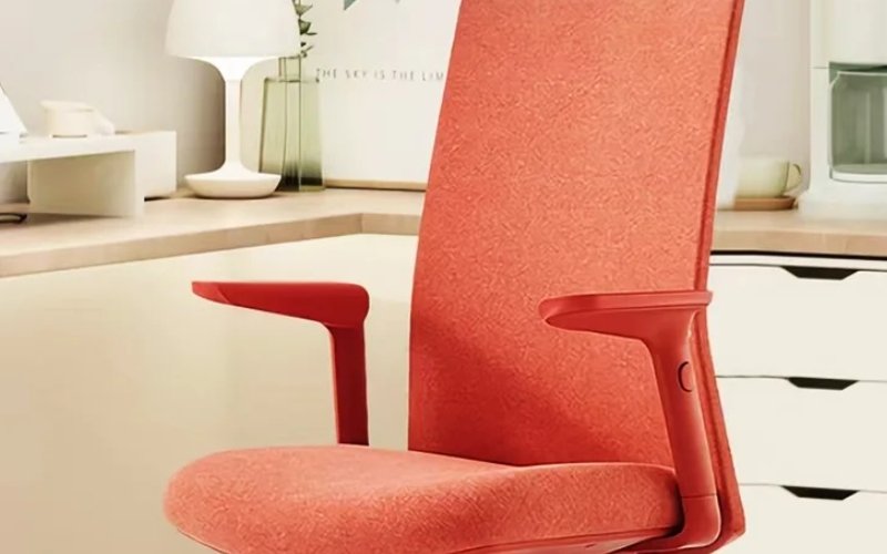 Person sitting comfortably in a compact office chair